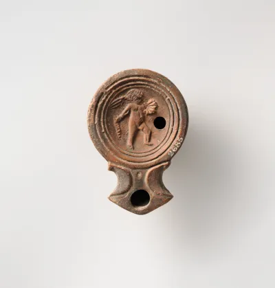 Terracotta oil lamp