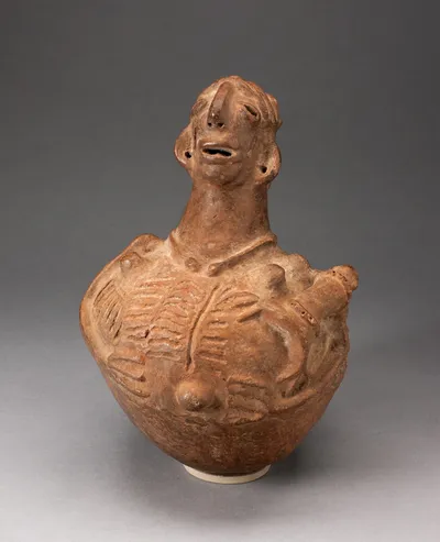 Figural Bottle