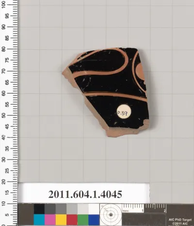 Terracotta fragment of a kylix (drinking cup)