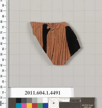 Terracotta fragment of a kylix (drinking cup)