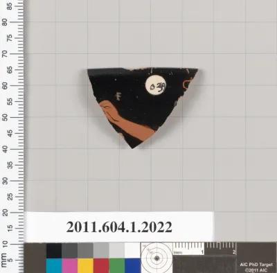 Terracotta rim fragment of a kylix (drinking cup)