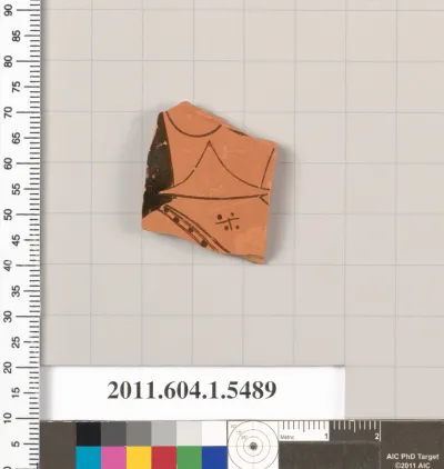 Terracotta fragment of a kylix (drinking cup)