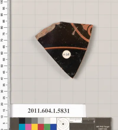 Terracotta fragment of a kylix: eye-cup  (drinking cup)