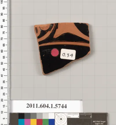 Terracotta fragment of a kylix: eye-cup  (drinking cup)