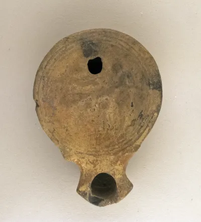 Terracotta oil lamp