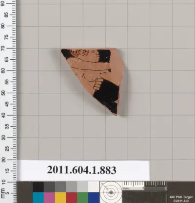 Terracotta fragment of a kylix (drinking cup)