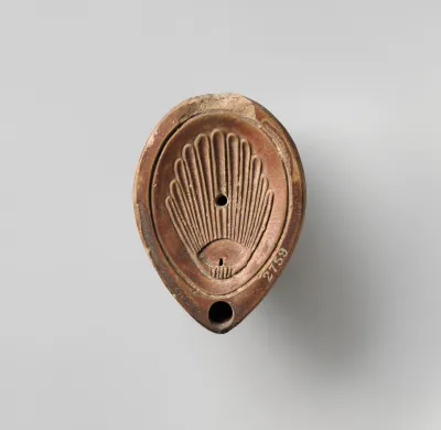 Terracotta oil lamp