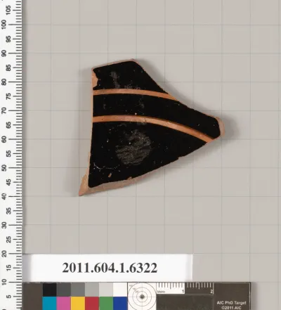 Terracotta fragment of a kylix (drinking cup)