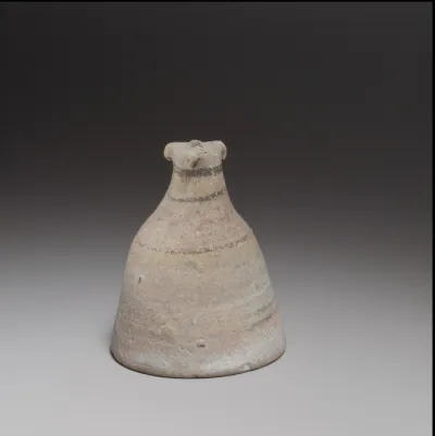 Bell with a zoomorphic handle