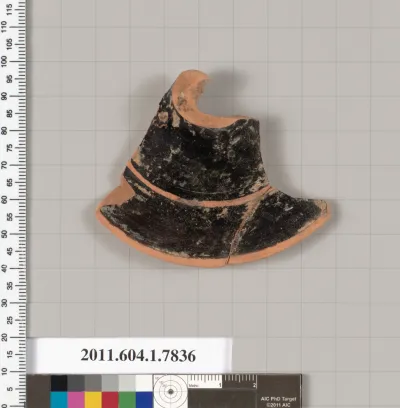 Terracotta fragment of a kylix (drinking cup)