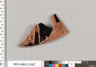 Terracotta fragment of a kylix (drinking cup)