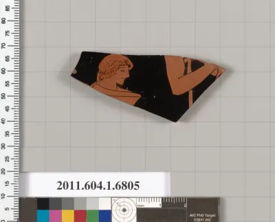 Terracotta fragment of a kylix (drinking cup)