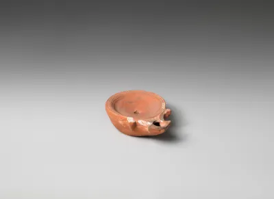 Terracotta oil lamp