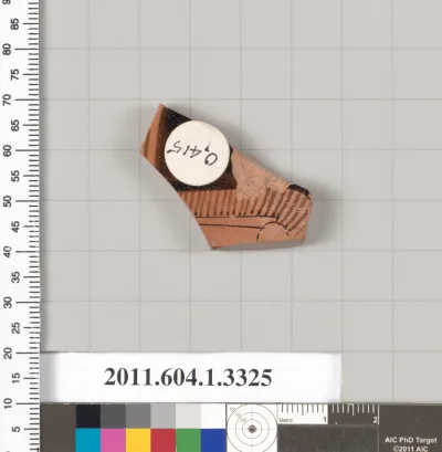 Terracotta fragment of a kylix (drinking cup)