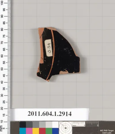 Terracotta fragment of a kylix (drinking cup)