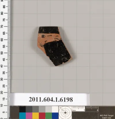 Terracotta rim fragment of a kylix (drinking cup)