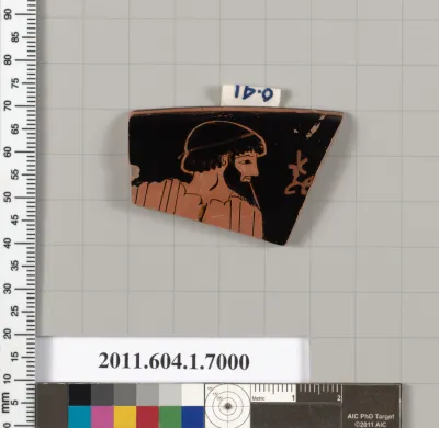 Terracotta rim fragment of a kylix (drinking cup)