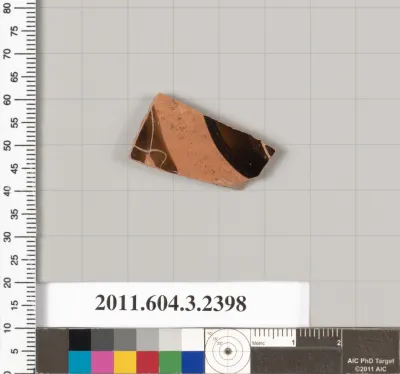 Terracotta fragment of a kylix: eye-cup (drinking cup)