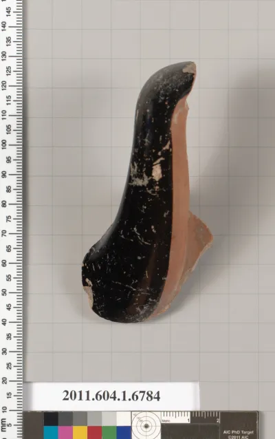 Terracotta fragment of a kylix (drinking cup)