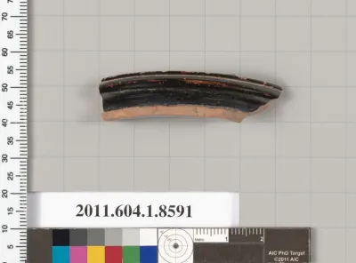 Terracotta fragment of a stemless kylix (drinking cup)