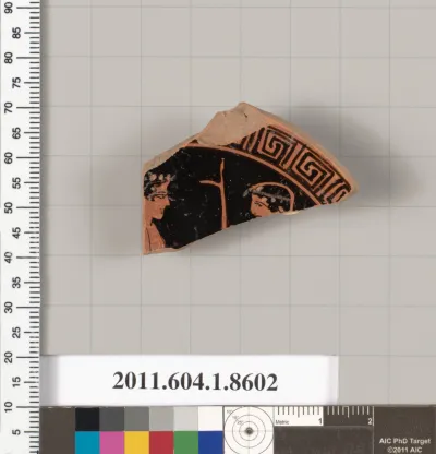 Terracotta fragment of a stemless kylix (drinking cup)