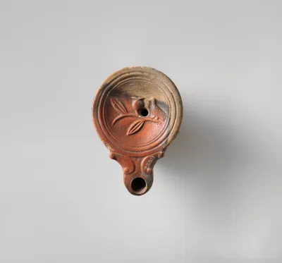 Terracotta oil lamp
