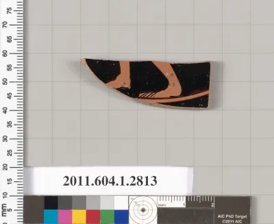 Terracotta fragment of a kylix (drinking cup)