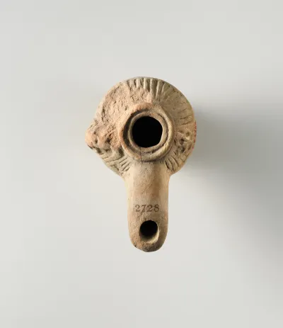 Terracotta oil lamp