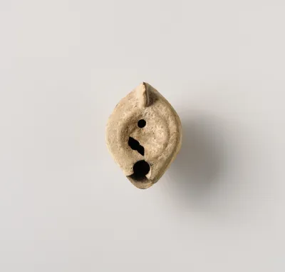 Terracotta oil lamp