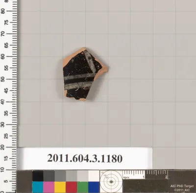 Terracotta fragment of a mastoid (drinking cup with narrow base) or a kyathos (cup-shaped ladle)