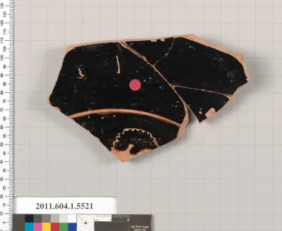 Terracotta fragment of a kylix (drinking cup)