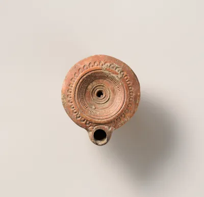 Terracotta oil lamp