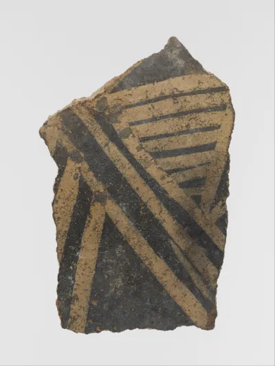 Terracotta vessel fragment with linear motifs
