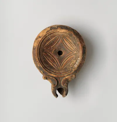 Terracotta oil lamp