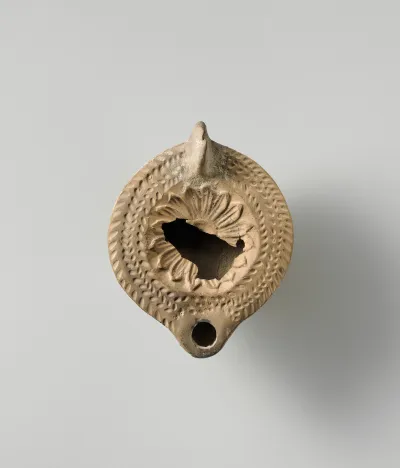 Terracotta oil lamp