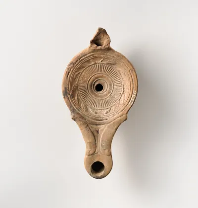 Terracotta oil lamp