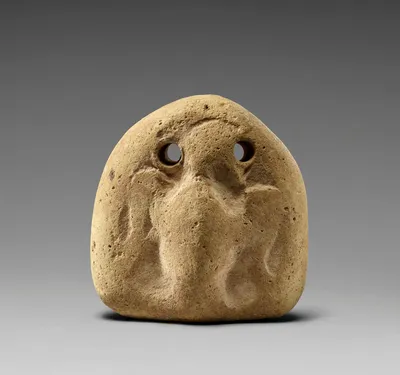 Loom weight with a head (Gorgon?)
