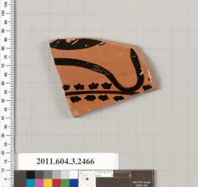 Terracotta fragment of a kylix: eye-cup (drinking cup)