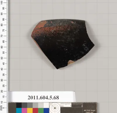 Terracotta rim fragment of a kylix (drinking cup)