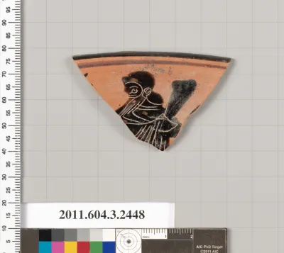 Terracotta rim fragment of a kylix (drinking cup)