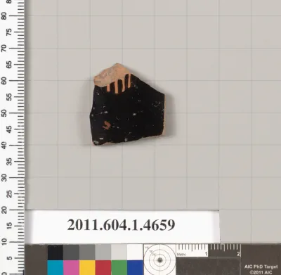 Terracotta fragment of a kylix (drinking cup)