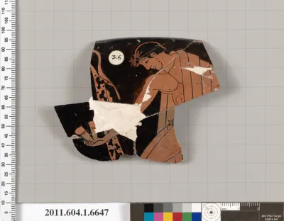 Terracotta rim fragment of a kylix (drinking cup)