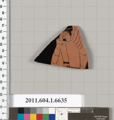 Terracotta fragment of a kylix (drinking cup)