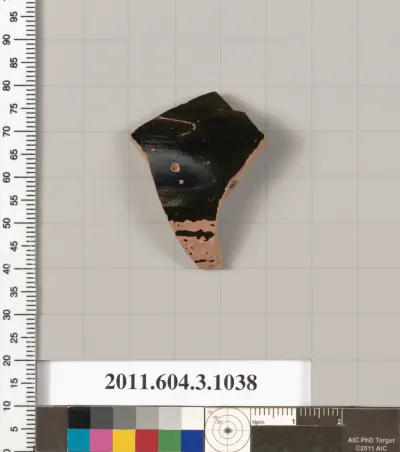 Terracotta fragment of a fish plate?