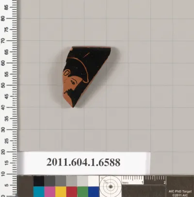 Terracotta rim fragment of a kylix (drinking cup)