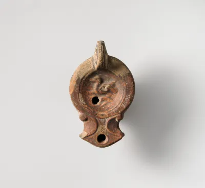 Terracotta oil lamp