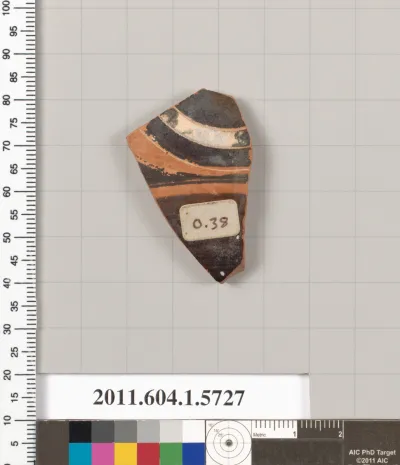 Terracotta fragment of a kylix: eye-cup  (drinking cup)