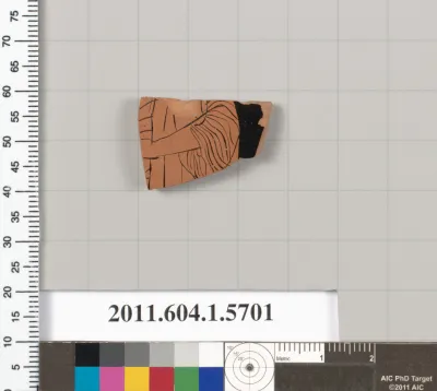 Terracotta fragment of a kylix (drinking cup)