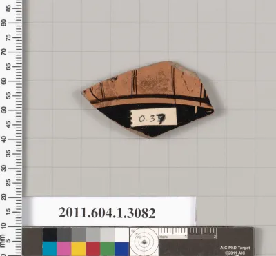 Terracotta fragment of a kylix (drinking cup)