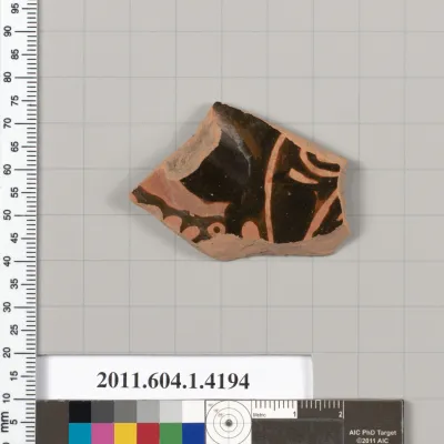 Terracotta fragment of a kylix (drinking cup)